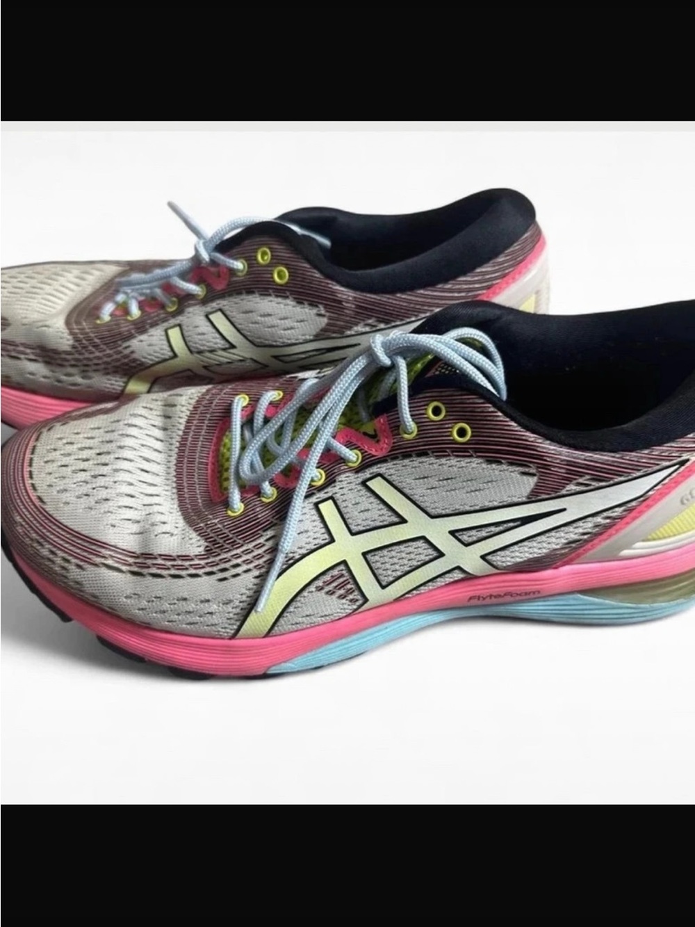 ASICS Gel Kayano 28
Multi-colored with pink, blue, and gray accents
Size 9